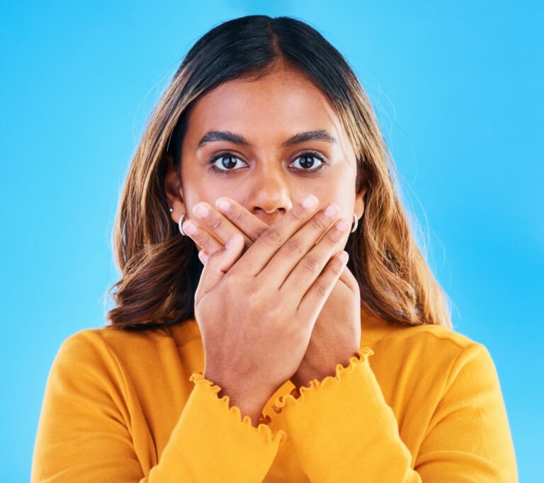 Shock, surprise and portrait of a woman in a studio with a omg, wtf or wow face expression. Amazed,